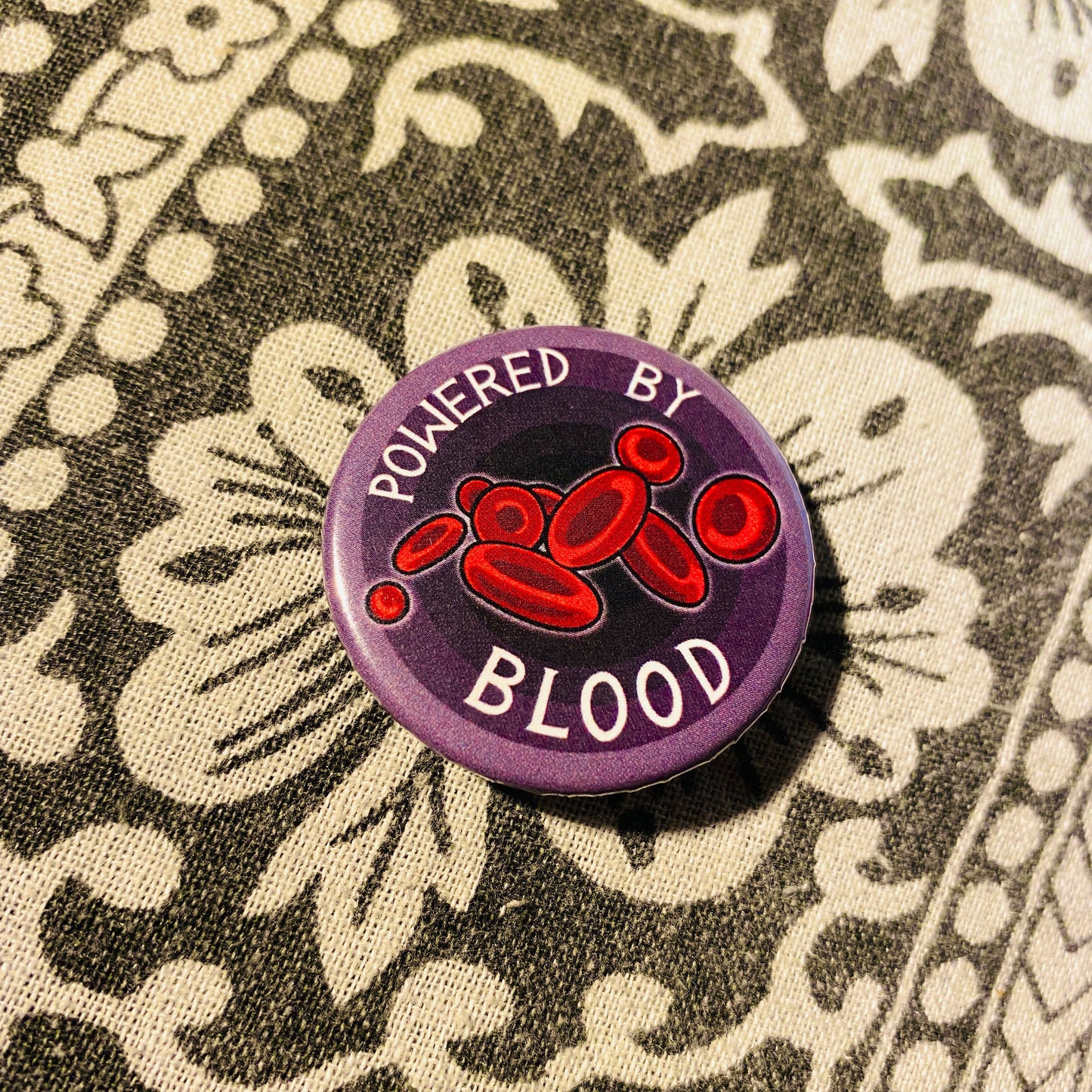 Powered By Blood - Gothic Button Pin Badge